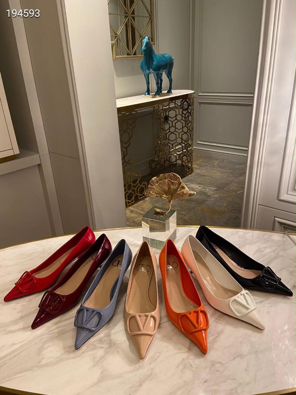 Pointed-Toe Buckle Pumps